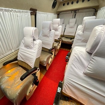 tempo traveller 9 seater price