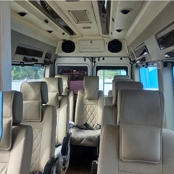 9 seater luxury tempo traveller price